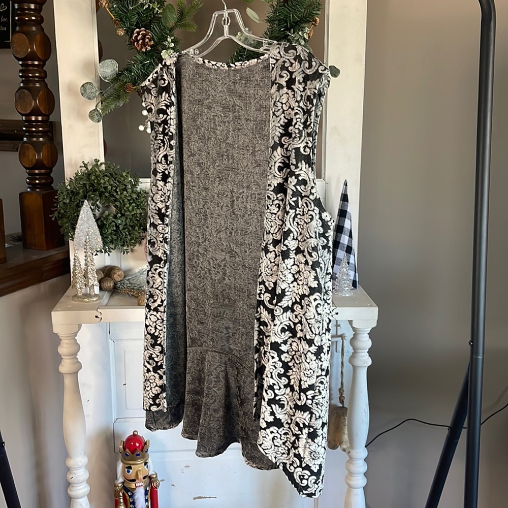 Dark gray and silver vest.